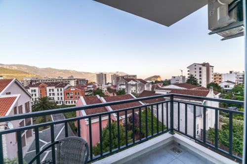 a balcony with a view of a city at Milara Apartments in Budva