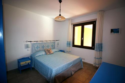En eller flere senge i et værelse på Naracauli