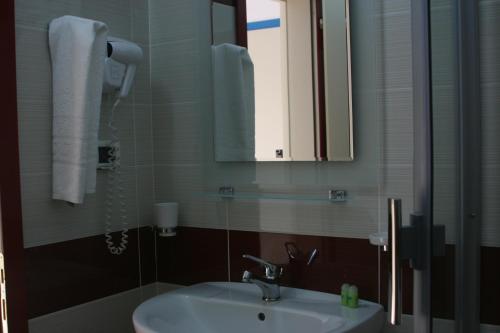 Koupelna v ubytování Hotel Siklad