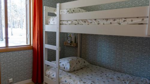 Postel nebo postele na pokoji v ubytování Sunshine Stuga Mörtsjön