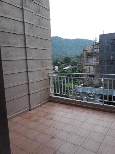 a view from the balcony of a building at Spanish villa , chinchoti in Bapane
