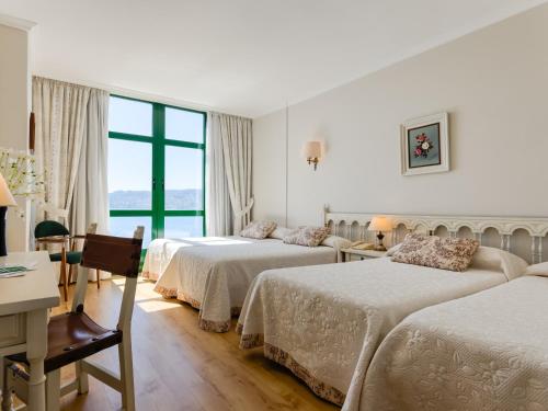 Katil atau katil-katil dalam bilik di Hotel Stellamaris