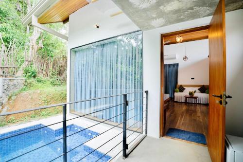 a home with a balcony with a plunge pool at Muthu Nila villas- Mirissa in Mirissa