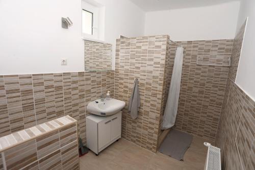 Koupelna v ubytování Total Relax Apartmanház