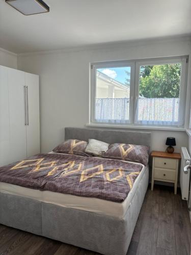 Ένα ή περισσότερα κρεβάτια σε δωμάτιο στο Apartment Emma&Lea