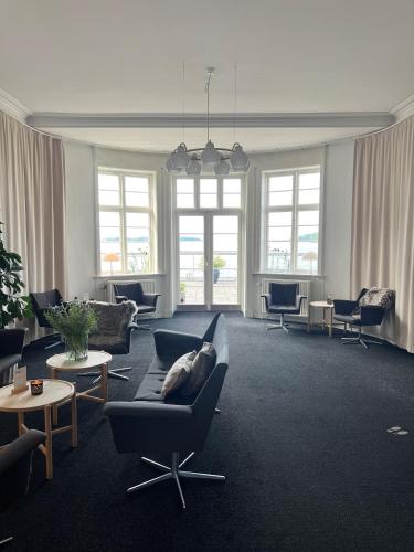 Un lugar para sentarse en Sixtus Sinatur Hotel & Konference
