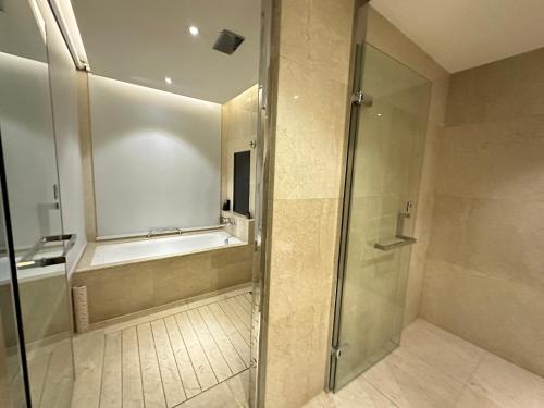 Koupelna v ubytování Suning Universal Hotel ALL-SUITES
