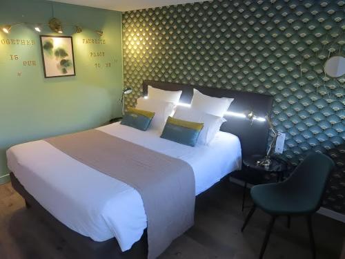 Postel nebo postele na pokoji v ubytování Hôtel Cap Sud Avignon - Réouverture - Ex Kyriad Hôtel