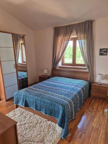 Ένα ή περισσότερα κρεβάτια σε δωμάτιο στο Villa Daniel