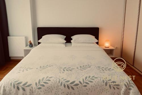 Ένα ή περισσότερα κρεβάτια σε δωμάτιο στο Apartments Blue Nest Banja Luka