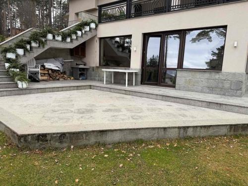 a house with a bench in front of it at Premium Studio Apartment in Private Villa Nisim in Batak