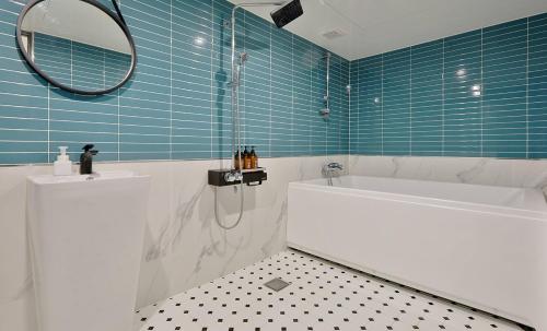 Ванная комната в Brown Dot Hotel Minam