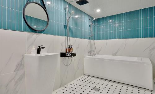 Ванная комната в Brown Dot Hotel Minam
