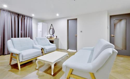 Гостиная зона в Brown Dot Hotel Minam