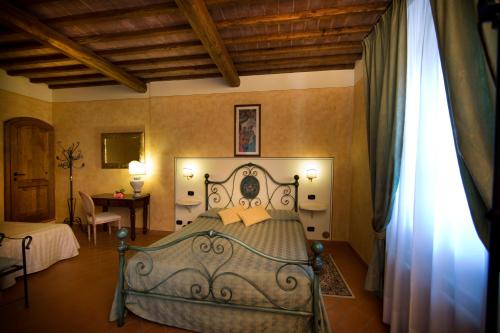 Posteľ alebo postele v izbe v ubytovaní IL COLOMBAIO WINERY & Rooms