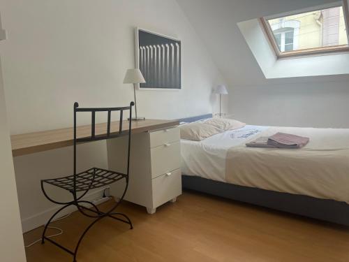 Postel nebo postele na pokoji v ubytování Le Loft, l'annexe
