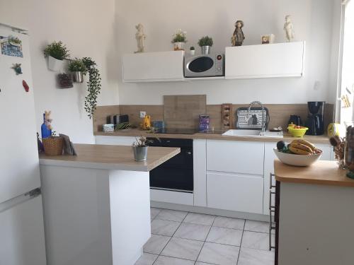 Photo de la galerie de l'établissement Chambre privée dans Petite maison typique, à Montivilliers