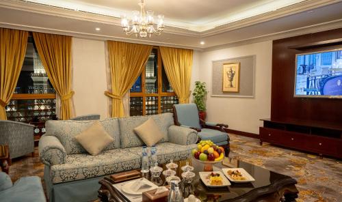 Coin salon dans l'établissement Dar Al Taqwa Hotel