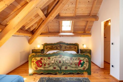 Postel nebo postele na pokoji v ubytování Agriturismo Fattoria Ortoalpino