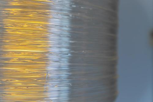 a close up of a coil of gold wire at Apartamento Vistas de Rajamanta | +Terraza, Playa + Garaje in Barbate