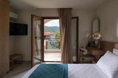 Postel nebo postele na pokoji v ubytování Hotel Pontos