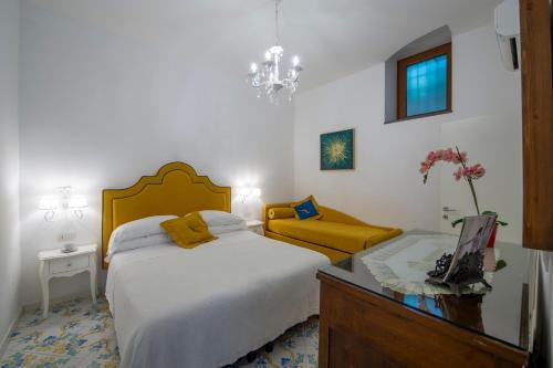 Ένα ή περισσότερα κρεβάτια σε δωμάτιο στο Casa Rispoli Praiano