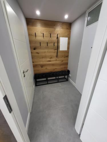a hallway with a wooden barn door in a house at Appartement Christina in Barsinghausen