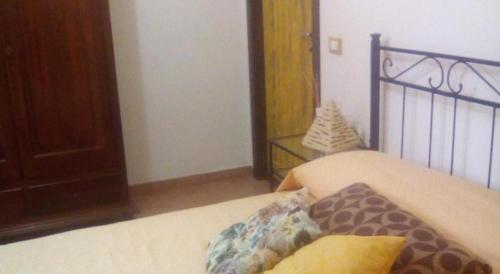Postel nebo postele na pokoji v ubytování B&B Casa te la Bradamante