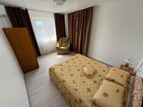 Postel nebo postele na pokoji v ubytování EthnoVilla - A comfortable Moldovan house for a peaceful and relaxing stay Молдавский, уютный дом для отдыха