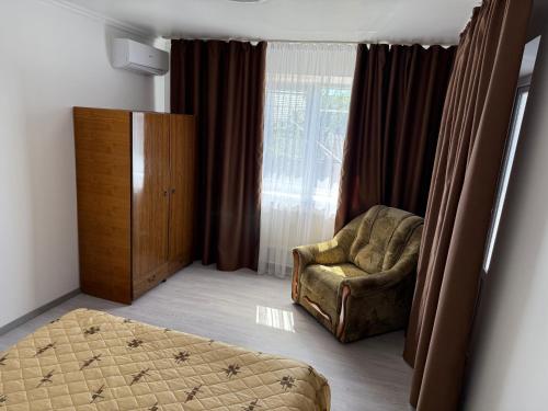 Posezení v ubytování EthnoVilla - A comfortable Moldovan house for a peaceful and relaxing stay Молдавский, уютный дом для отдыха