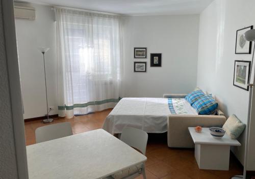 Postel nebo postele na pokoji v ubytování La Terrazza di Villa Ilaria