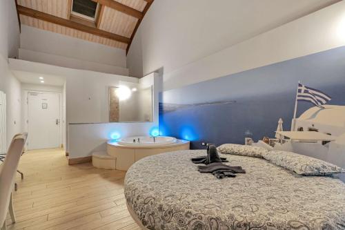 Una cama o camas en una habitación de Suite A Tema
