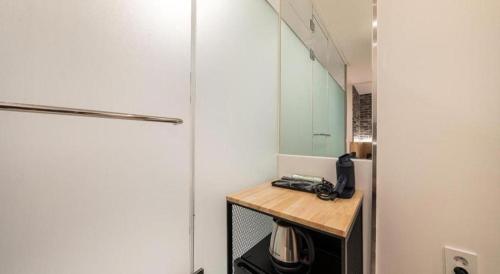 a room with a counter with a telephone on it at Crossing Hotel in Seoul