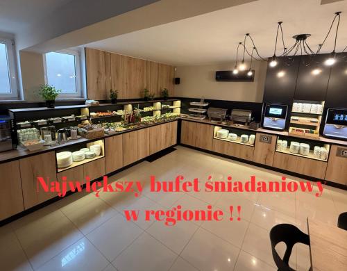 a restaurant kitchen with a buffet at Baltic Sun SPA in Rewal