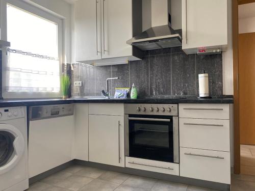 Η κουζίνα ή μικρή κουζίνα στο Maisonette - apartment in Siegen