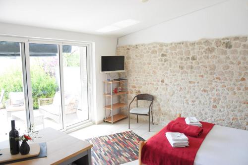Postel nebo postele na pokoji v ubytování Gartenapartment Villa Luger