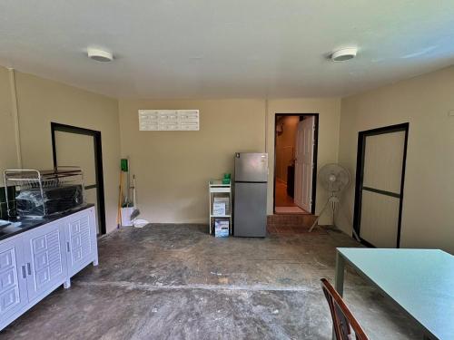 Küche/Küchenzeile in der Unterkunft Well Living Guesthouse Khaolak