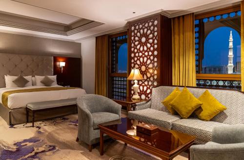 Un ou plusieurs lits dans un hébergement de l'établissement Dar Al Taqwa Hotel