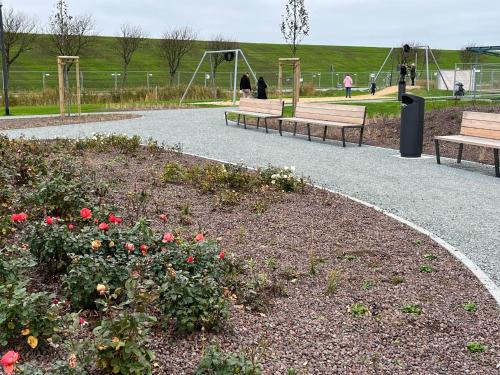 Taman di luar Ferienhaus Nordseejuwel