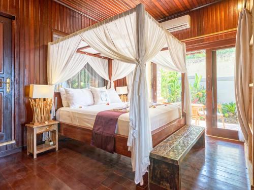 Katil atau katil-katil dalam bilik di Onlyou Villas