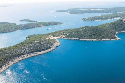 an aerial view of a group of islands in the water at Sea view BluEscape by Vellaris, Luxury Mobile Home in Mali Lošinj