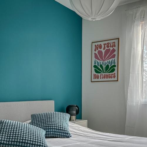 Ένα ή περισσότερα κρεβάτια σε δωμάτιο στο Villa du Brestalou - Vue & Calme