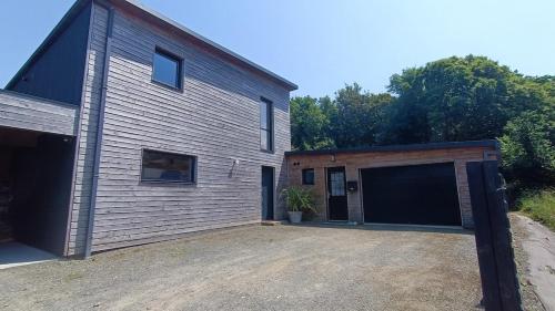 Photo de la galerie de l'établissement Maison loft Côte de Granit Rose, à Saint-Quay-Perros