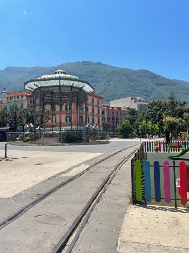 a building with a fence in front of a street at Il cottage Stabia Centro in Castellammare di Stabia
