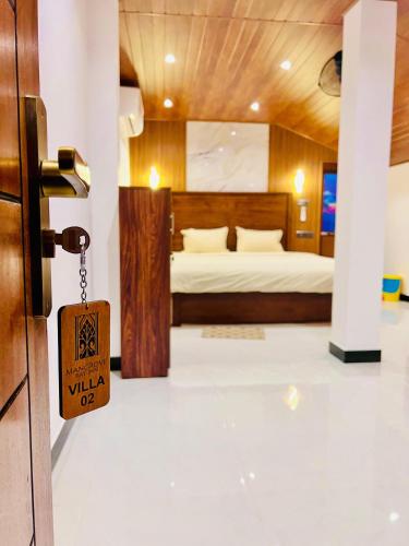 Ένα ή περισσότερα κρεβάτια σε δωμάτιο στο Mangrove Bay Inn