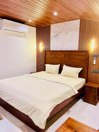 Ένα ή περισσότερα κρεβάτια σε δωμάτιο στο Mangrove Bay Inn