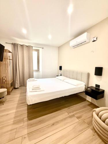 Katil atau katil-katil dalam bilik di Su Entu Guest House
