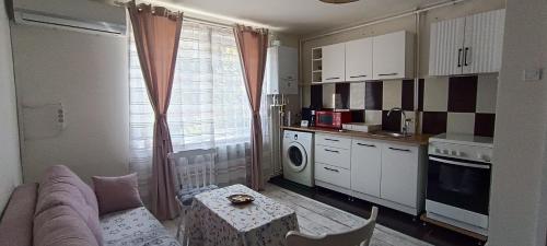 Kuchyň nebo kuchyňský kout v ubytování Feels like home