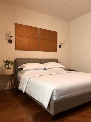 Ένα ή περισσότερα κρεβάτια σε δωμάτιο στο B&B Delta Majestic