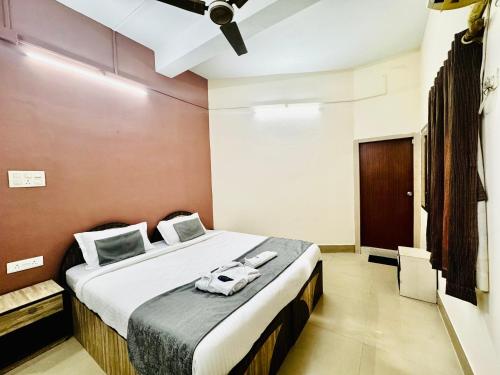 Ένα ή περισσότερα κρεβάτια σε δωμάτιο στο RM Guest Home